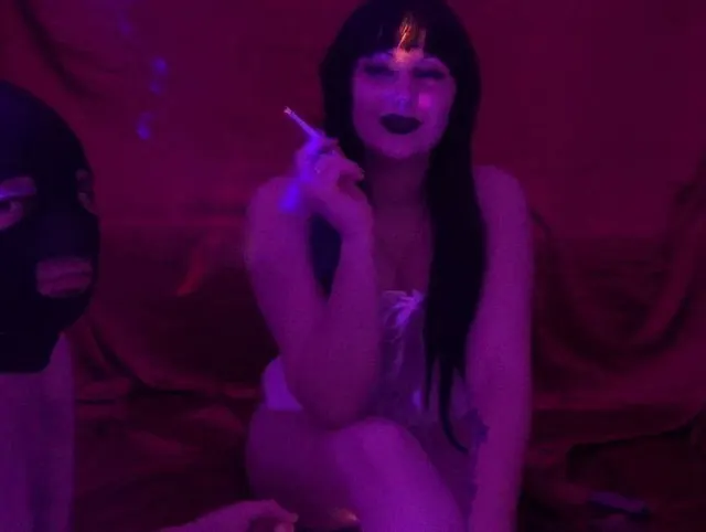 Your Goddess smoking and using human ashtray