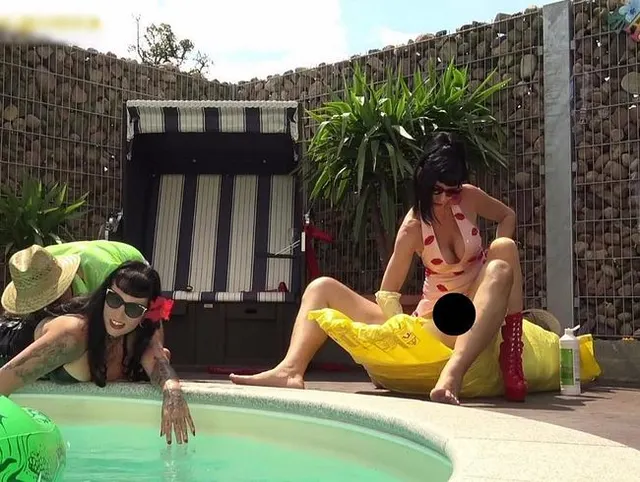 Carmen Rivera & Lady Vampira are celebrating a pool party with their slaves Part 2