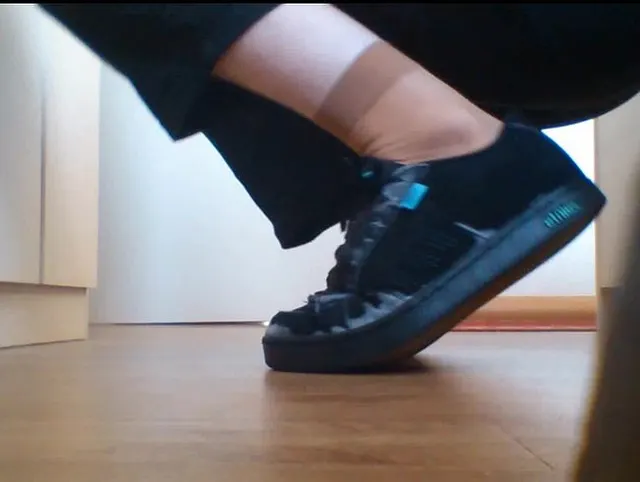 Schuh und Nylonfuss Spiel